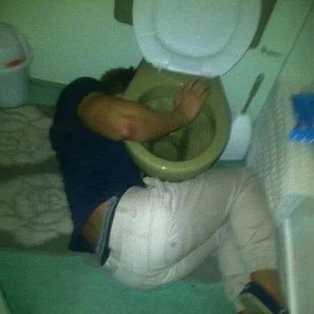 Teenage Lee Walpole getting comforted by a toilet seat, after a night out on the booze.